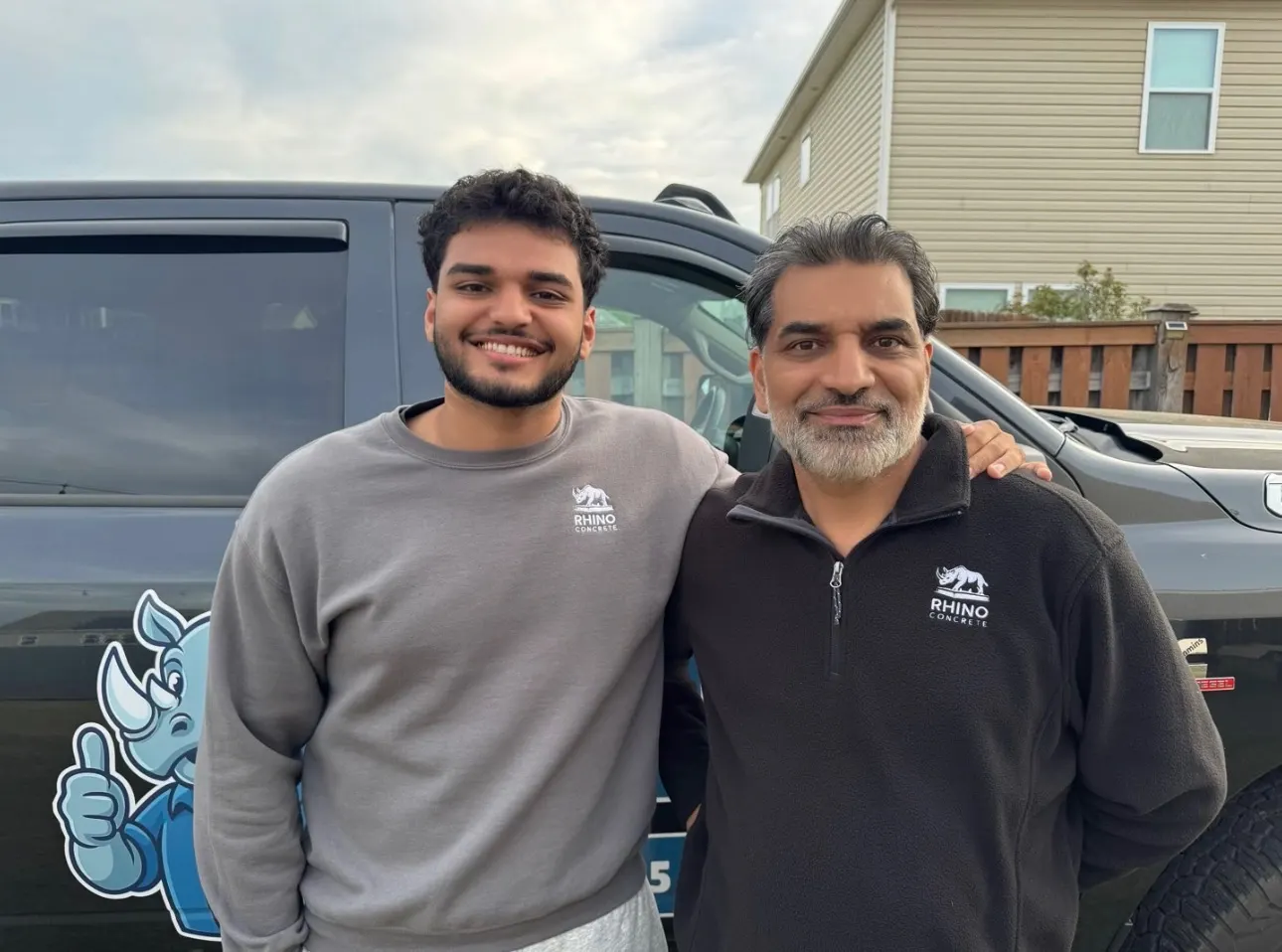 The Rhino Concrete founders in front of the company truck in Charlotte